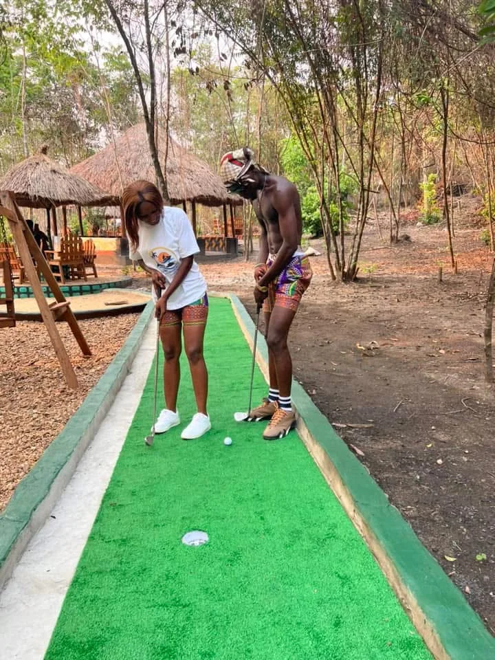 Visitors on a putting lane